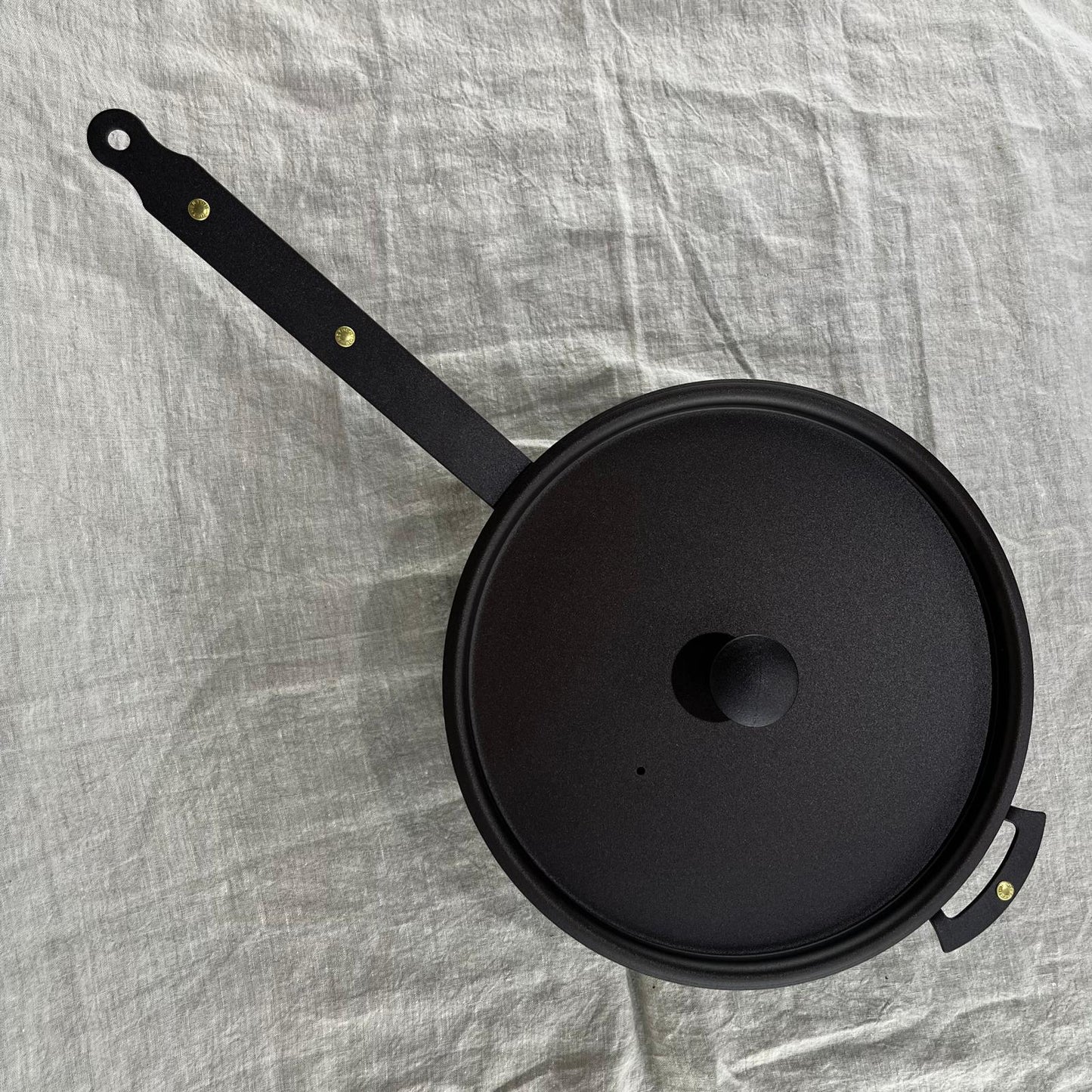NFS-473FH Netherton Foundry 11" oven safe sauteuse pan with lid