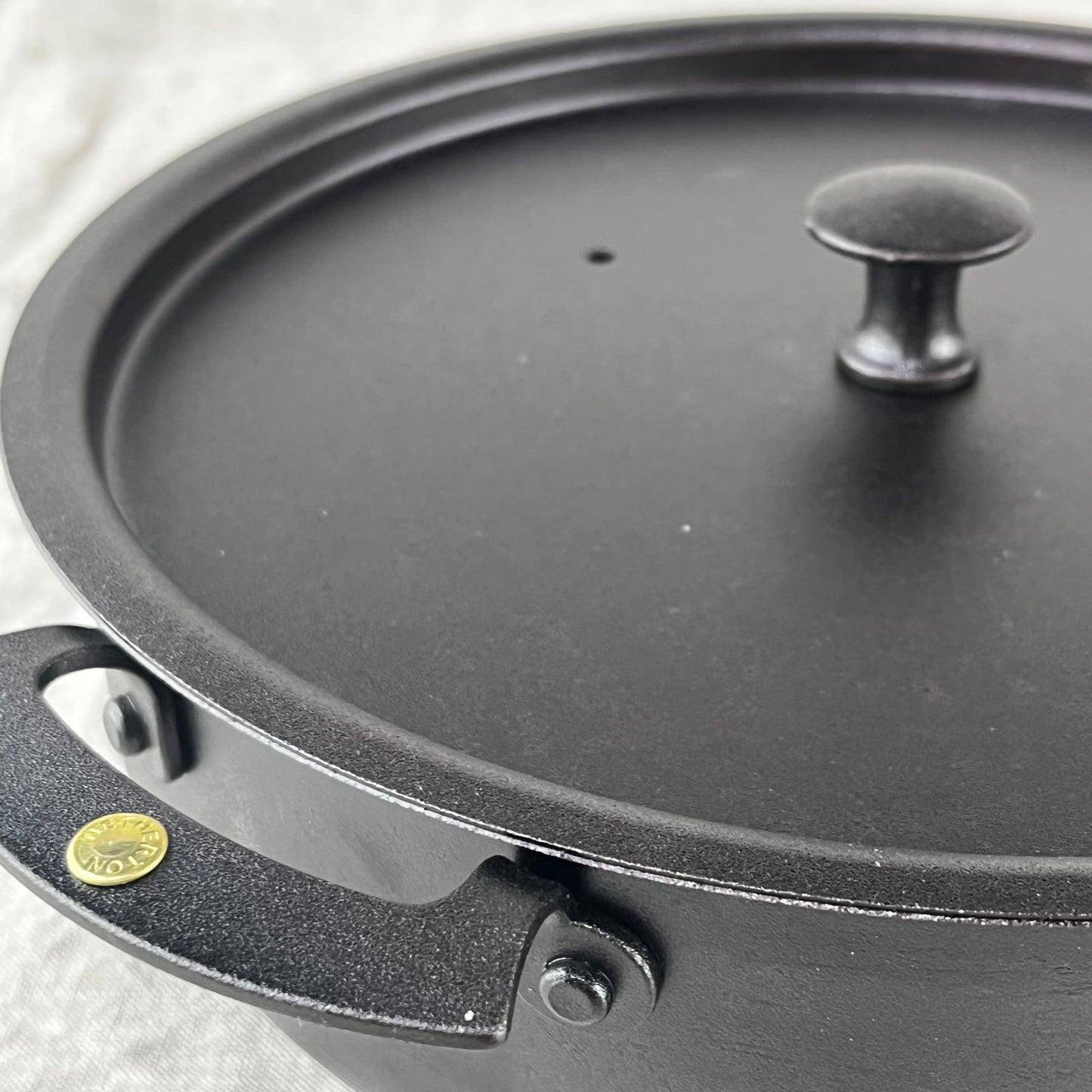 NFS-491FH Netherton Foundry 9" oven safe sauteuse pan with lid