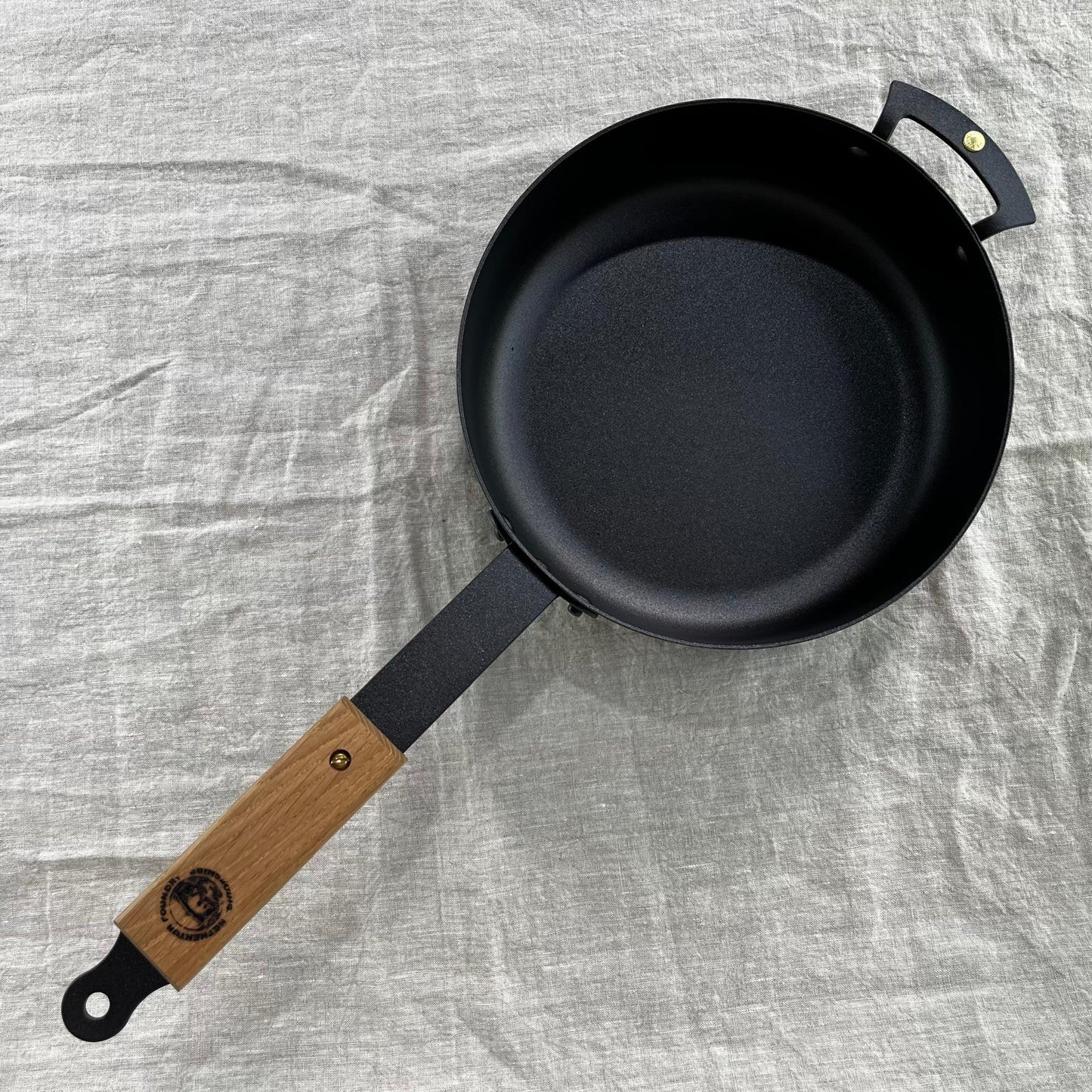 NFS-484FHDB Netherton Foundry 9" ebonised sauteuse pan