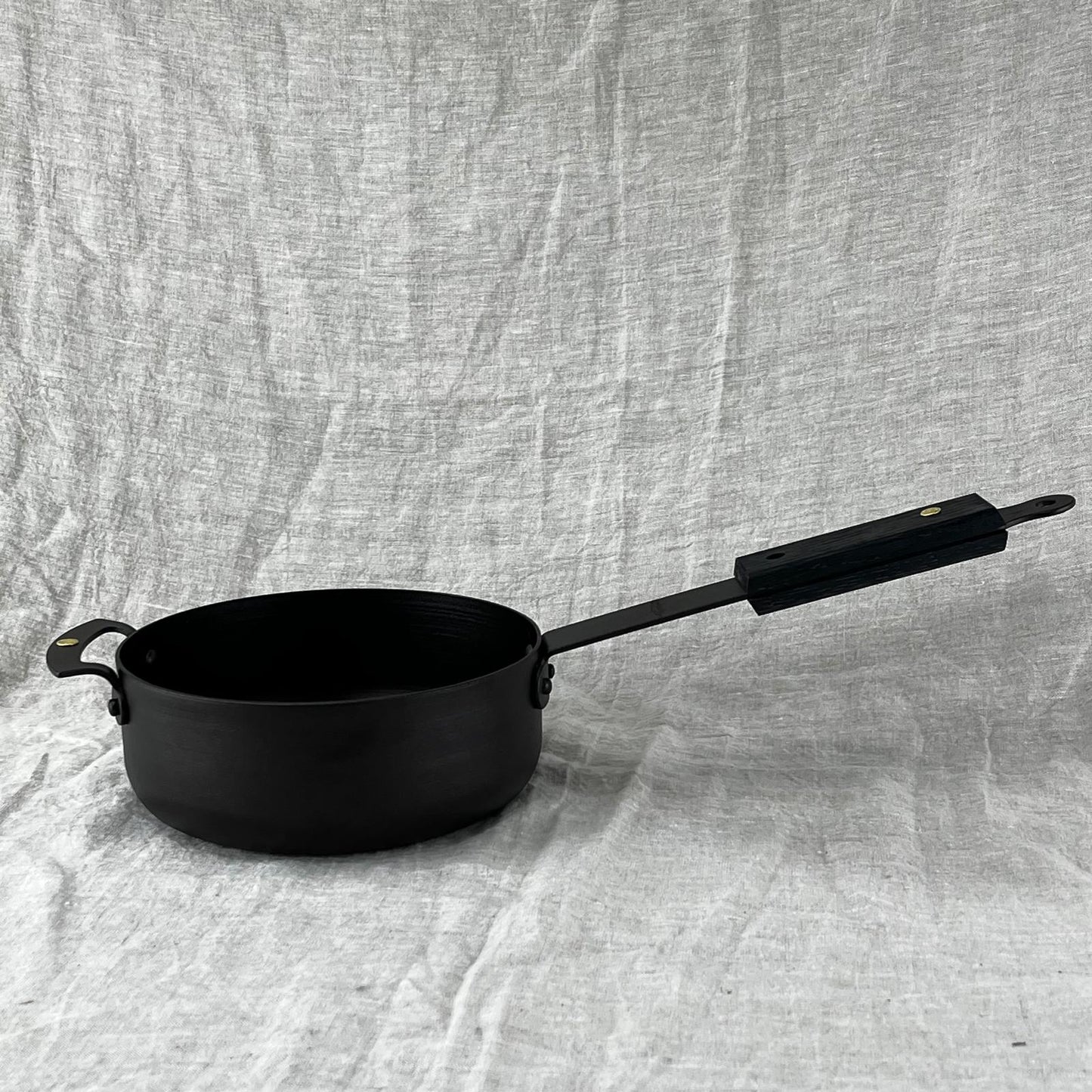 NFS-498FHDB Netherton Foundry 7" ebonised sauteuse pan