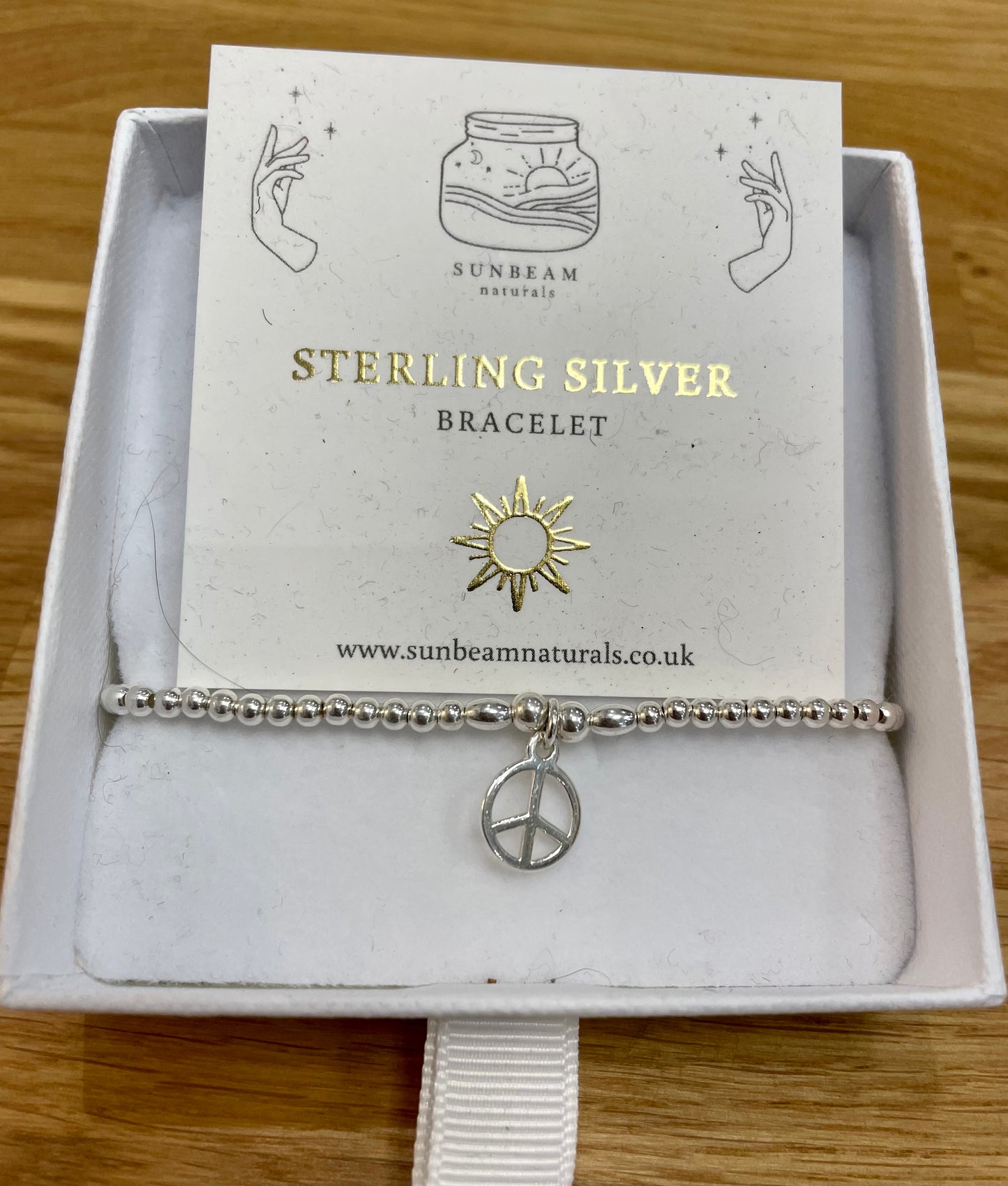 Sunbeam Naturals / Sterling Silver - Peace charm